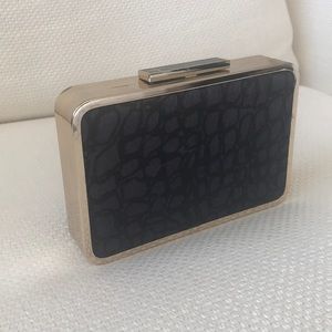 Pour La Victoire Black and Gold Calf hair Clutch